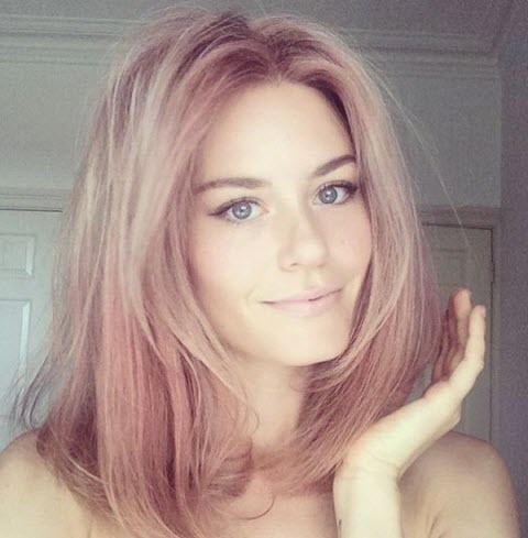 Fashionable pink shade on hair