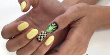 Bright manicure with fruits and flowers
